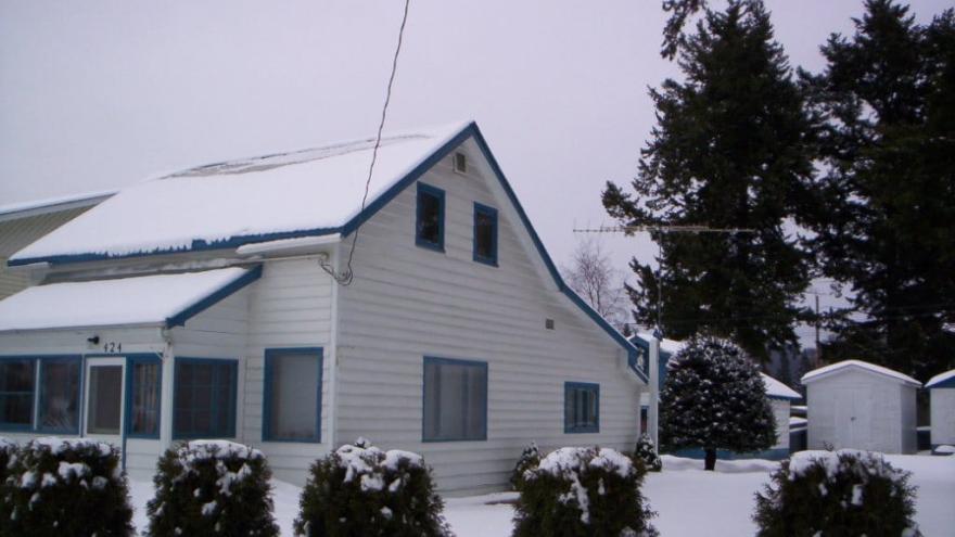 Early House - Front and South Elevation